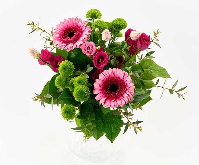 Lyserød buket, floristens valg - Send blomster med Bloomit