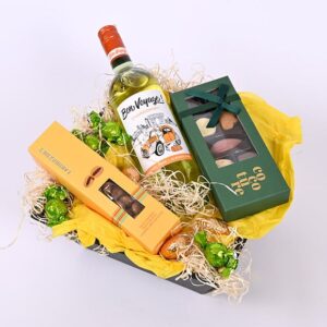 Påskekurv med alkoholfri hvidvin - Send blomster med Bloomit