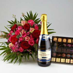 Romantiske roser, mousserende vin og chokolade - Send blomster med Bloomit